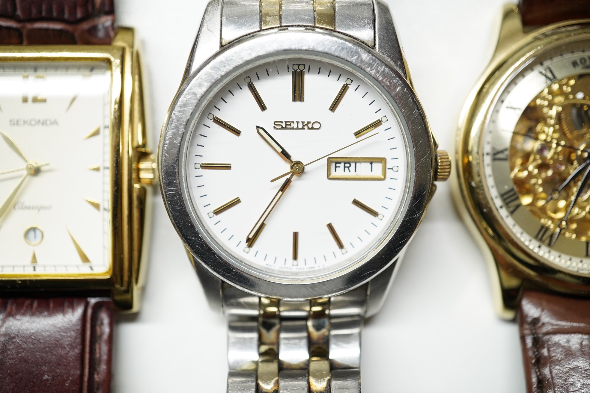 Four assorted gentleman's modern wrist watches, including Seiko, Sekonda and Rotary. Condition - fair to good